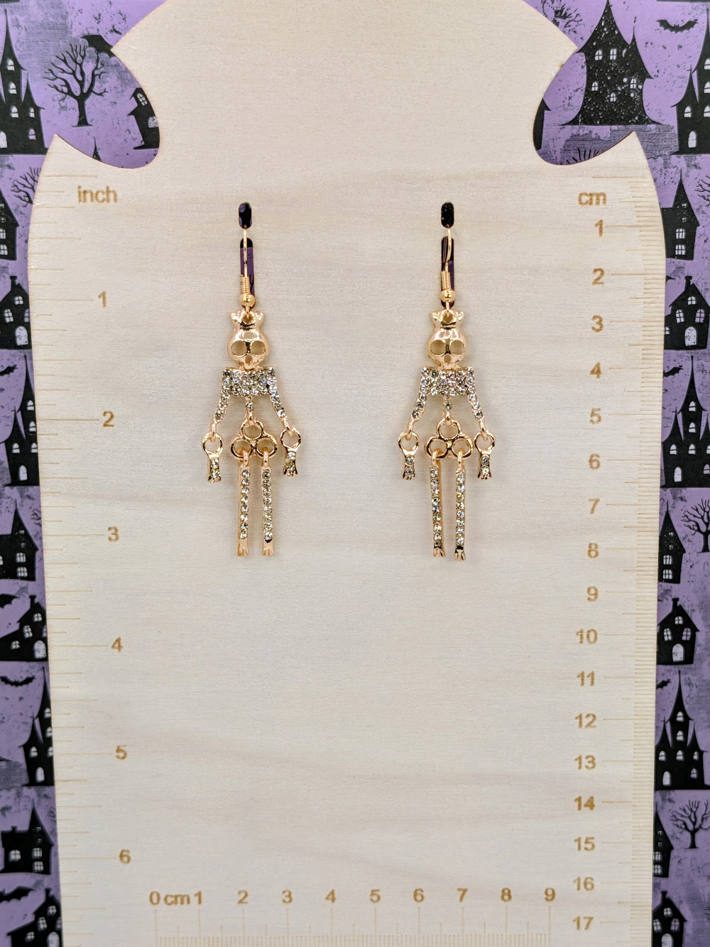 Gold Tone Metal With Rhinestone Accent Skeleton Earring Set